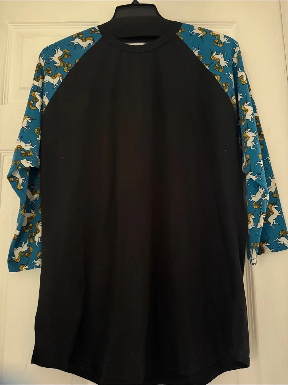 LuLaRoe Black Raglan Top with Teal Unicorn-Print Sleeves